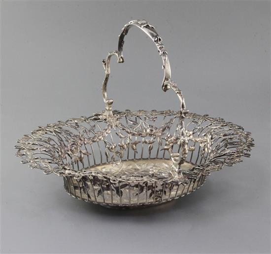 A George III pierced silver oval epergne basket, by Vere & Lutwyche, engraved with the Heneage family crest, 32.5 oz.